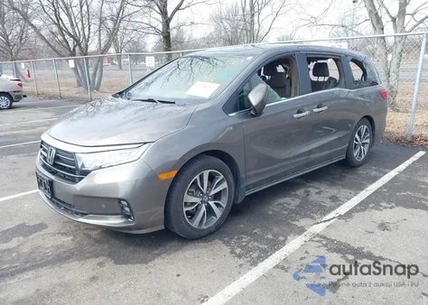 2021 Honda Odyssey Touring z USA, uszkodzony, nr VIN 5FNRL6H8XMB006701